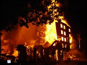 Flames engulfing building at MLK and Monroe. Photo from Portland Fire and Rescue.