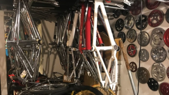 BMX bike frames hanging from ceiling